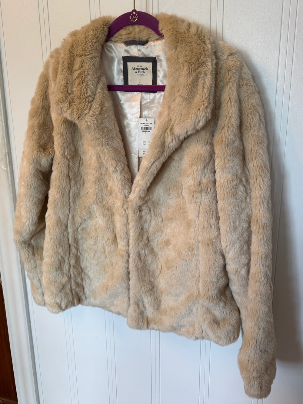 Women’s size large faux fur tan coat